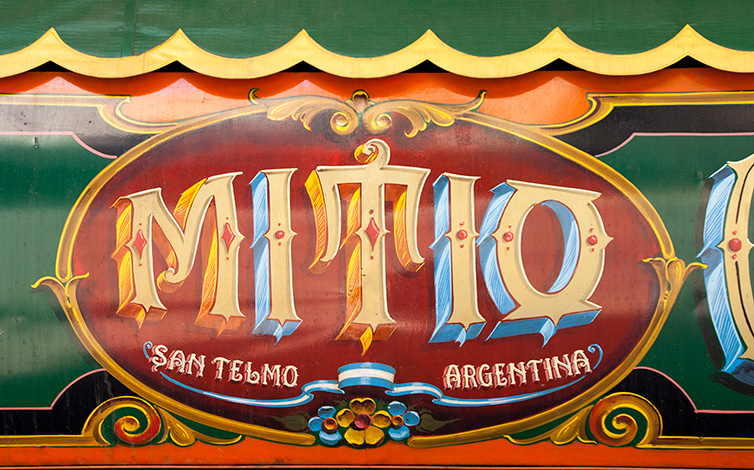 hand painted sign that say Mitio, San Telmo, Argentina