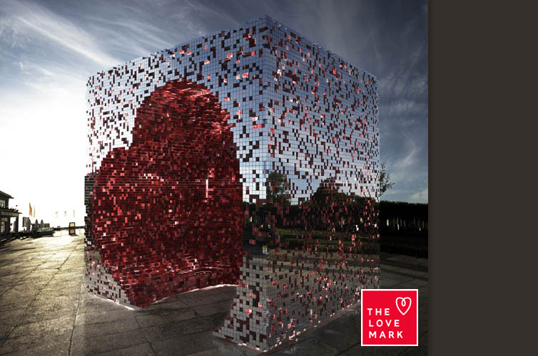 conceptual large heart sculpture with big blue sky