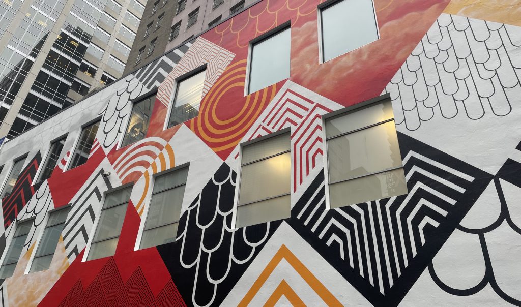 Downtown Spirits mural colorful squares and patterns daytime